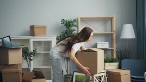 Woman reflecting on anxiety about moving to a new home